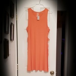 Stylish peach colored mini dress- lace up on sides